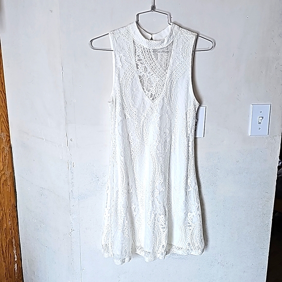 Shop the Opulent Sleeveless A-Line Mini Dress White